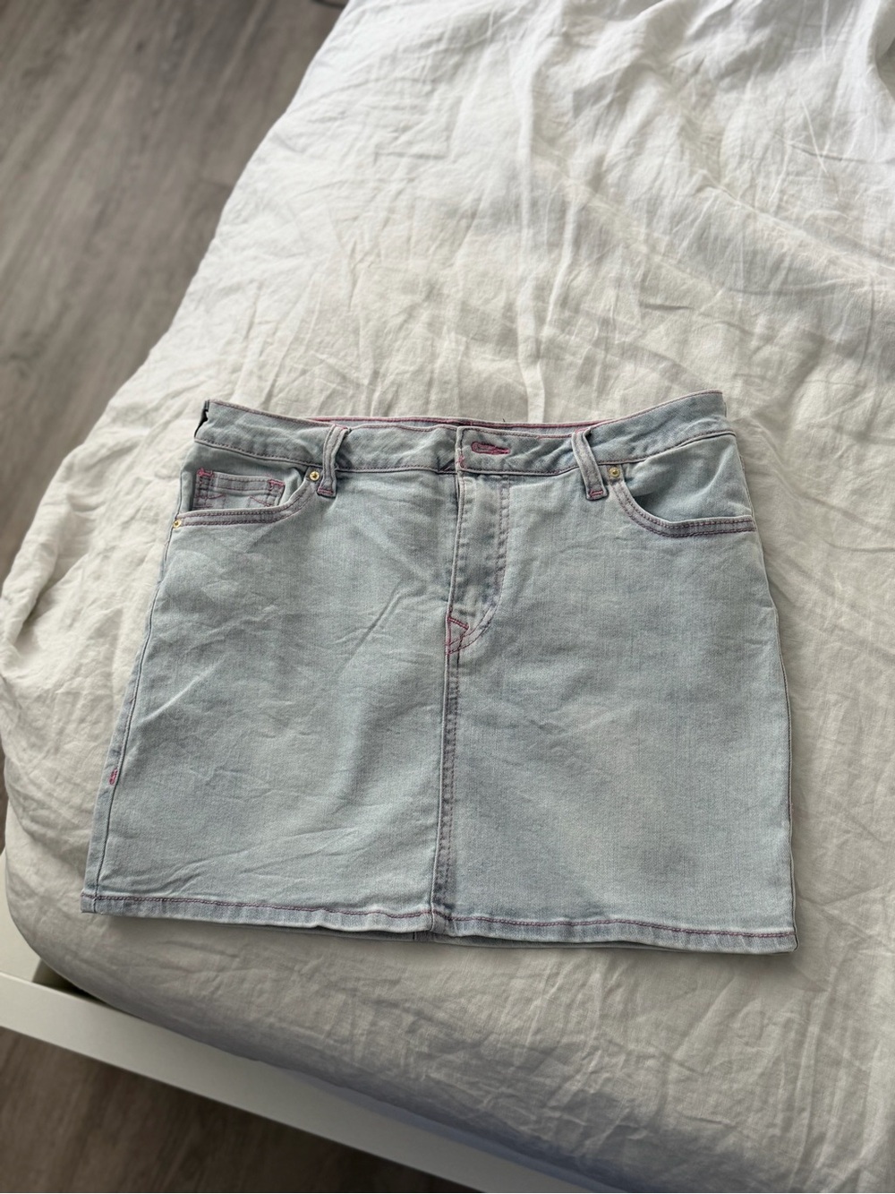 True Religion Light Wash Denim Mini Skirt with Pink Stitching
